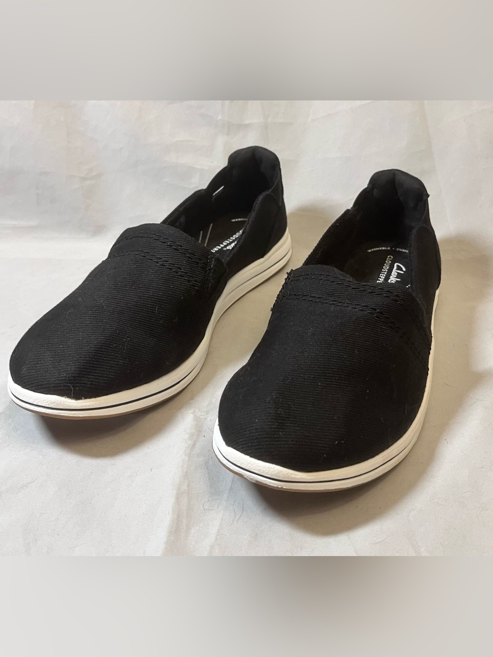 Clarks Cloudsteppers Black Slip-On Moccasins with White Trim